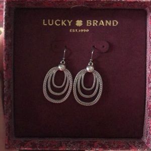 New in Box silver earrings